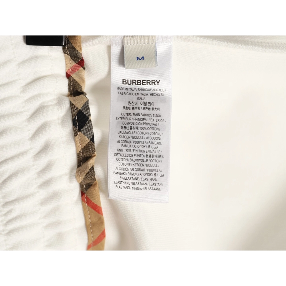 Burberry check-trimmed equestrian embroidered shorts,Burberry