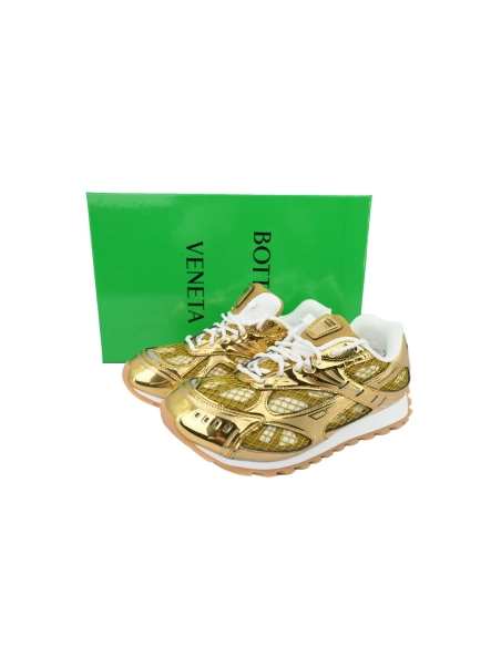 premium reps Bottega Veneta Orbit Sneaker Golden sneakers at Shoes Official. Shop iconic styles from top brands