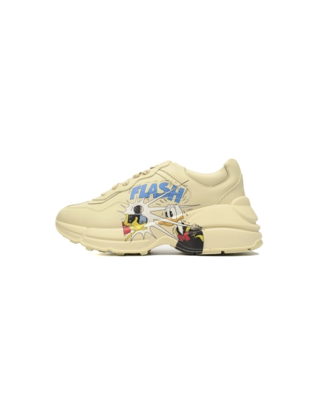 premium reps Gucci Rhyton x Disney Donald Duck sneakers at Shoes Official. Shop iconic styles from top brands
