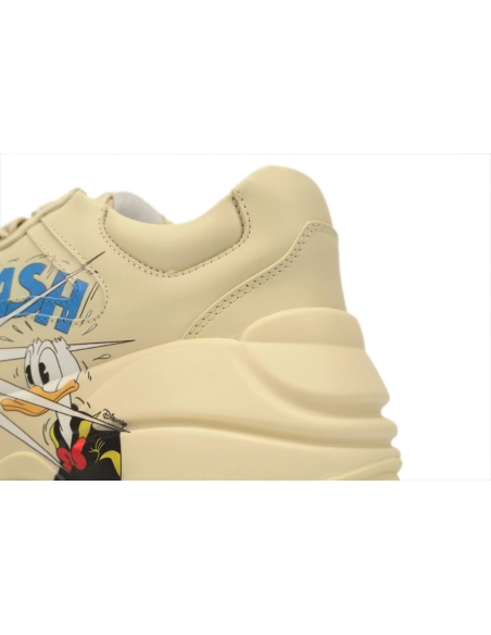 premium reps Gucci Rhyton x Disney Donald Duck sneakers at Shoes Official. Shop iconic styles from top brands