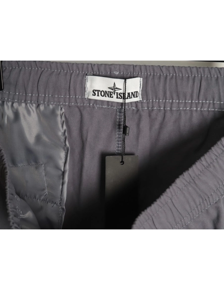 Stone Island Compass patch multipocket cargo trousers,Stone Island Trousers,CASUAL PANTS,APPAREL