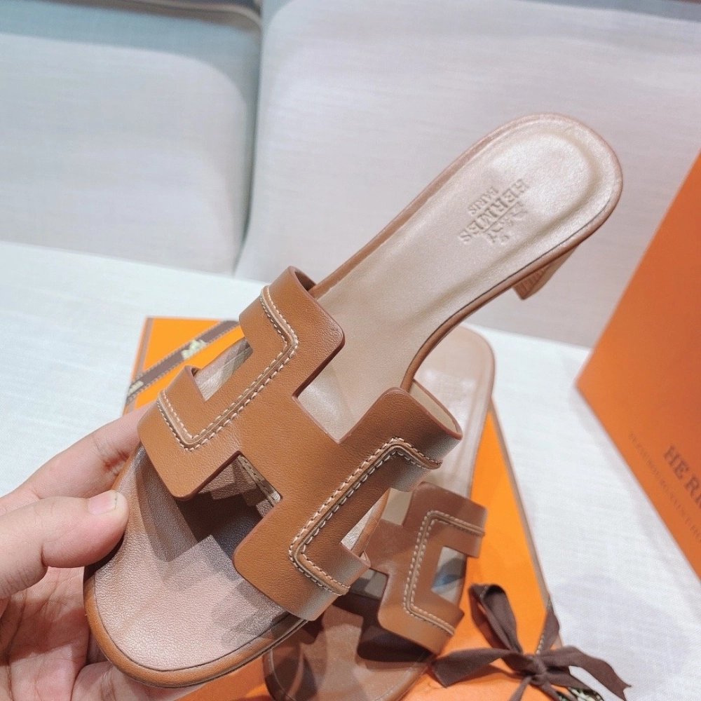 Hermes mid-heel slides