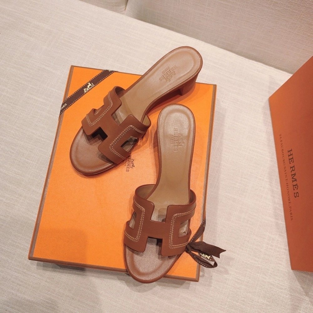 Hermes mid-heel slides