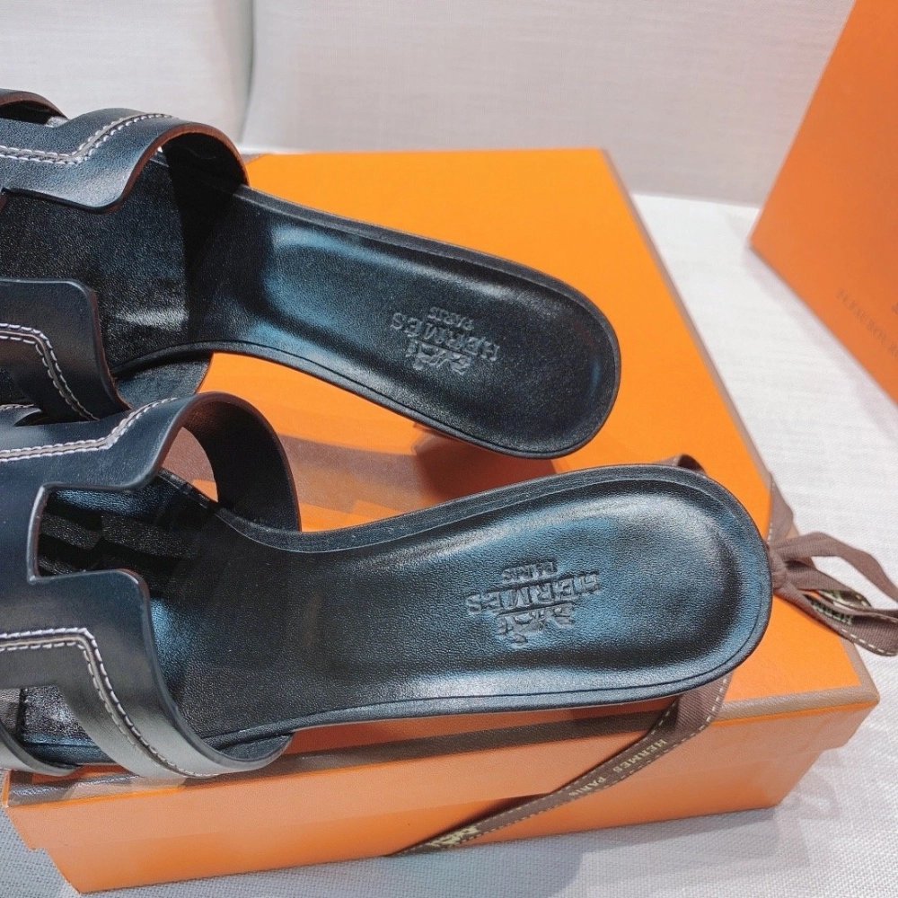 Hermes mid-heel slides